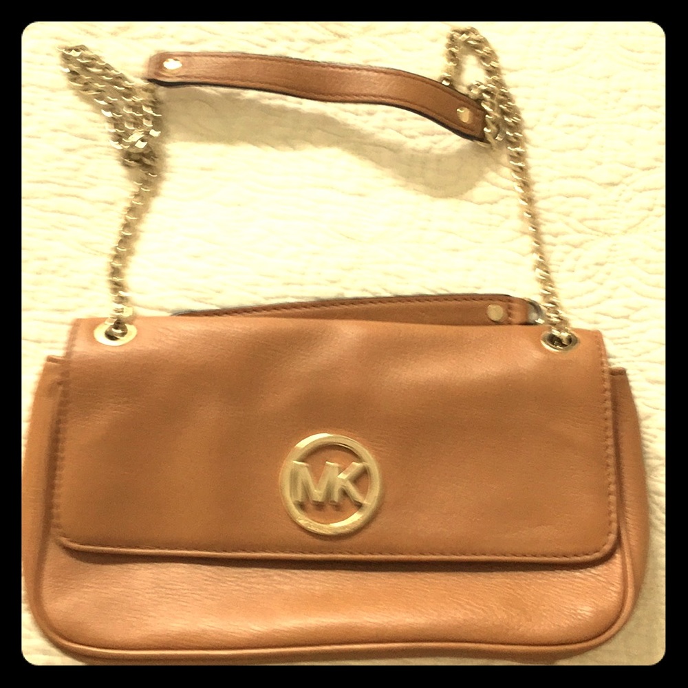 Michael Kora tan clutch with gold shoulder strap